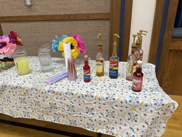 A table of drinks and refreshments set out for the evening
