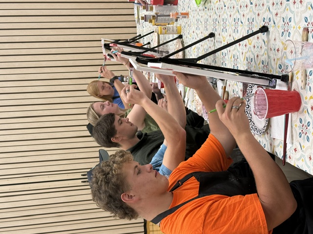 Painters making their first brush strokes at the start of the evening